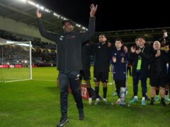 Maidstone manager George Elokobi acknowledges the crowd with his players after their FA Cup run came to an end (Barrington Coombs/PA)