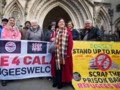 The mayor of Portland Carralyn Parkes (centre), who is bringing the legal challenge, joins Dorset residents outside the Royal Courts Of Justice in London (Victoria Jones/PA)