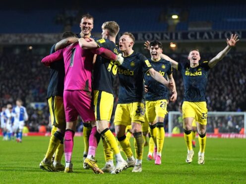 Martin Dubravka celebrates with team-mates after Newcastle’s penalty shoot-out win at Blackburn (Nick Potts/PA)