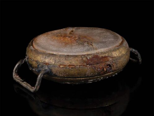 The watch melted during the bombing of Hiroshima (Nikki Brickett/RR Auction via AP)