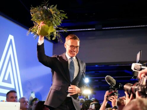 National Coalition Party candidate Alexander Stubb celebrates after winning the second round of the presidential election during an election party night in Helsinki, Finland (Sergei Grits/AP)