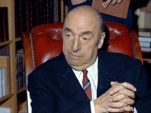 Pablo Neruda sits in Paris in October 1971. An appeals court in Chile’s capital ruled that the case of his death be reopened, saying the investigation has not been exhausted and new steps could help clarify the cause of his death (Michel Lipchitz/AP)