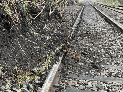 Tens of thousands of train passengers suffered severe disruption as repairs were carried out following a landslip on one of the UK’s busiest rail routes (Network Rail/PA)