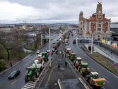 Farmers with tractors stand on a street in the centre of the Czech capital during a demonstration on Monday (Ondrej Deml/CTK via AP)