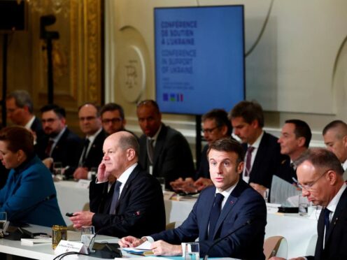 Emmanuel Macron, centre right, has suggested Western troops could be sent to Ukraine (Gonzalo Fuentes/Pool via AP)