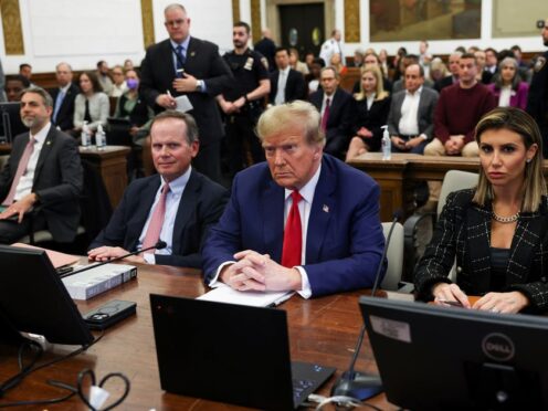 Former US president Donald Trump, centre, is appealing against the civil fraud lawsuit judgment made in a New York court (Shannon Stapleton/Pool Photo via AP, File)