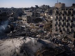 An Israeli strike destroyed residential buildings in Rafah (Fatima Shbair/AP)