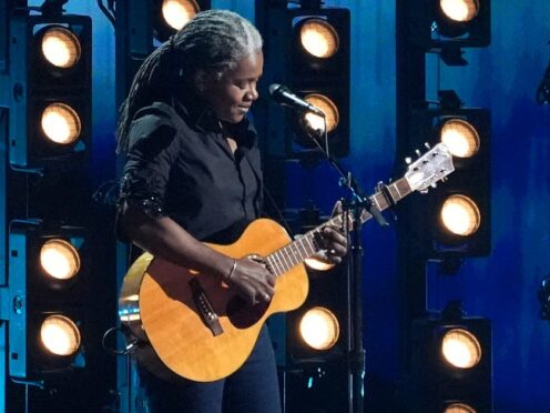 Tracy Chapman performs “Fast Car” during the 66th annual Grammy Awards on Sunday in Los Angeles. (AP Photo/Chris Pizzello)