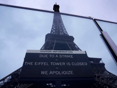 Visits to the Eiffel Tower were disrupted on Monday because of a strike over poor financial management of the monument (Michel Euler/AP)
