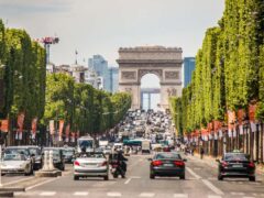 Traffic on the Champs-Elysees in Paris (Alamy/PA)