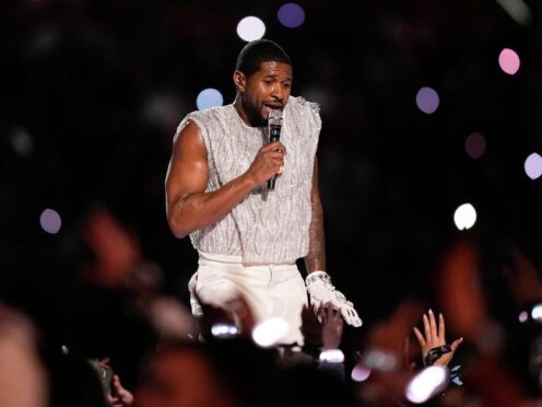 Usher performs during half-time of the Super Bowl (Brynn Anderson/AP/PA)