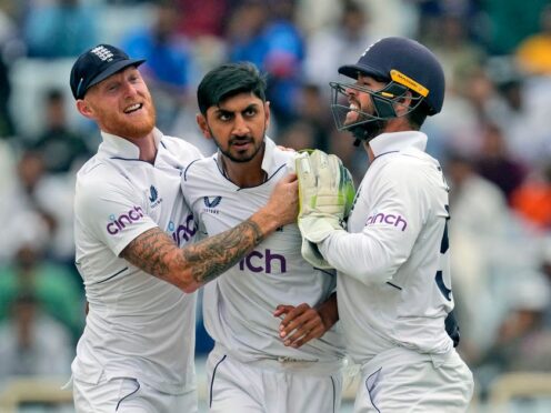 Shoaib Bashir, centre, took three wickets as England made inroads (Ajit Solanki/AP)