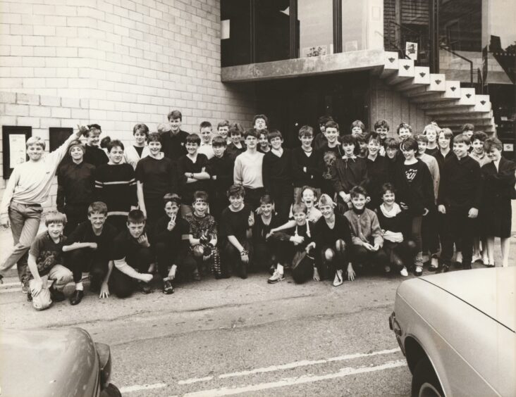 Arbroath Academy pupils pose for a picture outside Dundee Rep. 