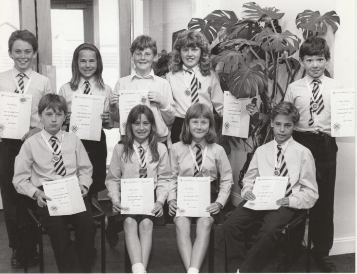 Cross-country pupils with their certificates in 1992.