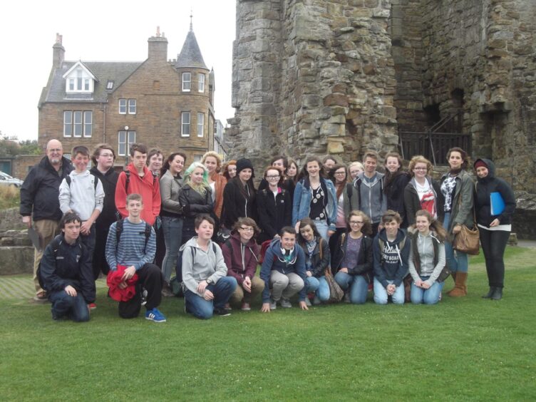 History teacher Fiona Milne with students at the castle in 2015. 