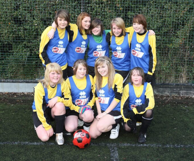 The Academy team line up before kick off. 