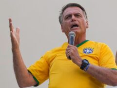 Jair Bolsonaro has been accused of approaching too close to a humpback whale (AP Photo/Andre Penner)