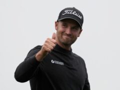 Wyndham Clark gestures after finishing the 18th hole at Pebble Beach Golf Links during the third round of the AT&T Pebble Beach National Pro-Am golf tournament in Pebble Beach, California (Ryan Sun/ AP)