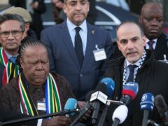 South Africa’s foreign minister Naledi Pandor, left, and Palestinian assistant minister of Multilateral Affairs Ammar Hijazi, right, address reporters after session of the International Court of Justice, in The Hague after the court stopped short of ordering a cease-fire in Gaza in a genocide case (Patrick Post/AP)