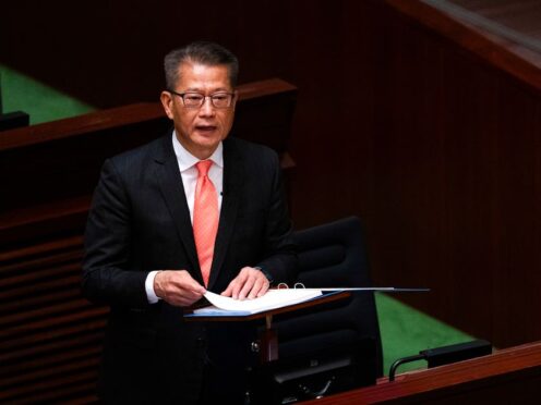 Hong Kong’s Finance Secretary Paul Chan delivers the annual budget address (AP)
