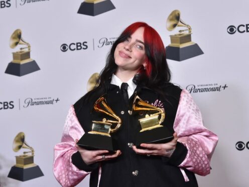 Billie Eilish with her Grammys for best song written for visual media and song of the year for What Was I Made For? from Barbie The Album (Richard Shotwell/Invision/AP)
