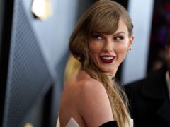 Taylor Swift arrives at the 66th annual Grammy Awards (Jordan Strauss/Invision/AP)