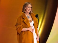 Celine Dion presents the award for album of the year during the 66th annual Grammy Awards (AP Photo/Chris Pizzello)