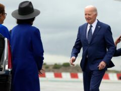 President Joe Biden greets Los Angeles Mayor Karen Bass as he arrives at Los Angeles International Airport ((Manuel Balce Ceneta/AP)