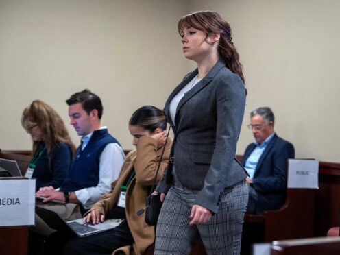 Hannah Gutierrez-Reed walks into court for the first day of testimony in her trial in Santa Fe (Eddie Moore/Santa Fe New Mexican via AP, Pool)