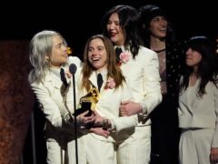 Phoebe Bridgers Julien Baker, and Lucy Dacus, of boygenius, accept the award for best rock song (Chris Pizzello/AP)