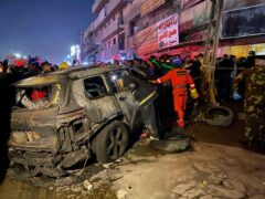 A car was hit by a drone strike (Hadi Mizban/AP)