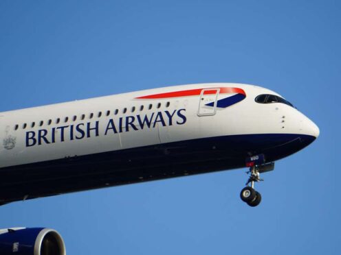 The owner of British Airways is set to report soaring sales last year (Alamy/PA)