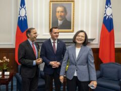 Taiwanese President Tsai Ing-wen (right) meets representatives Mike Gallagher (centre) and Raja Krishnamoorthi (left) (Taiwan Presidential Office via AP/PA)