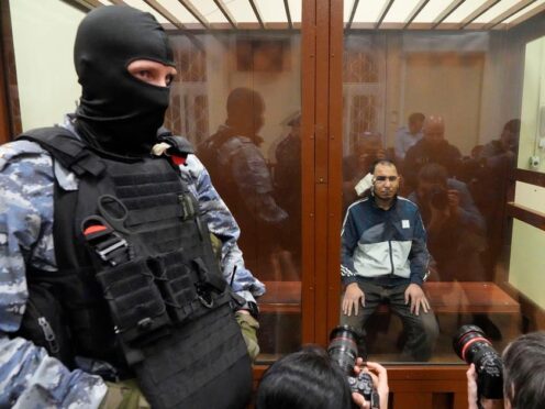 Four suspects charged with carrying out the terrorist attack appeared in court on Sunday (AP Photo/Alexander Zemlianichenko)