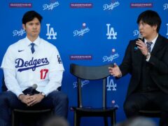 Los Angeles Dodgers’ Shohei Ohtani, left, and interpreter Ippei Mizuhara answer questions during a news conference at Dodger Stadium in December in Los Angeles (Ashley Landis/AP)