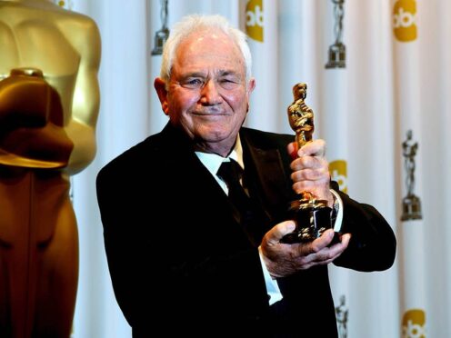 David Seidler with the best original screenplay award, received for The King’s Speech, at the 83rd Academy Awards in Los Angeles in 2011 (Ian West/PA)