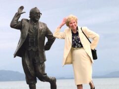 Joan Morecambe, the widow of comedian Eric Morecambe, with a statue in honour of her husband (John Giles/PA)