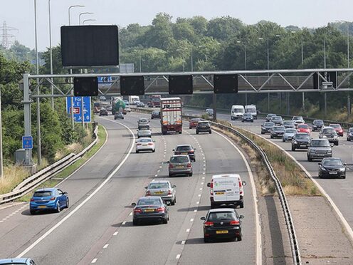 EDS NOTE: NUMBERPLATE HAS BEEN PIXELATED AT SOURCE Undated Highways Agency handout photo of a car on the hard shoulder of a motorway, as instances of illegal stopping on motorway hard shoulders include people picking flowers, renewing their insurance and even trying to sell their car.