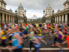 Runners pass the Old Naval College, Greenwich, during the 2016 Virgin Money London Marathon (Dominic Lipinski/PA)