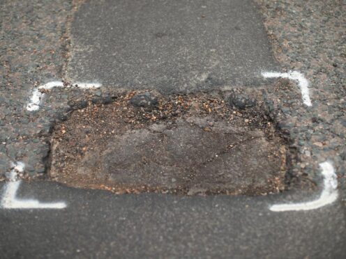 A pothole on a road in Islington, London.