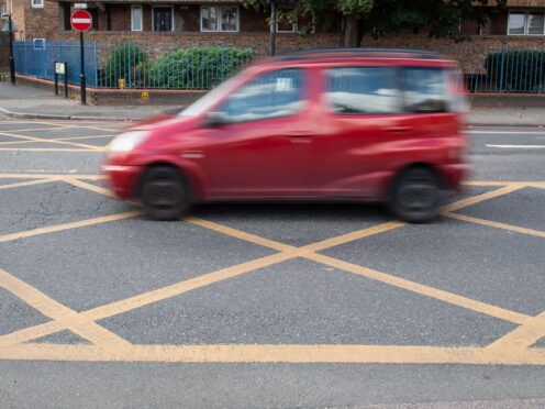 Yellow boxes are used in an attempt to ensure traffic flows smoothly through busy junctions (Dominic Lipinski/PA)