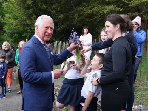Charles is known for his love of flowers and gardening (Liam McBurney/PA)