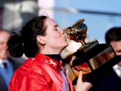 Rachael Blackmore kisses the Gold Cup after her victory in 2022 (David Davies/PA)