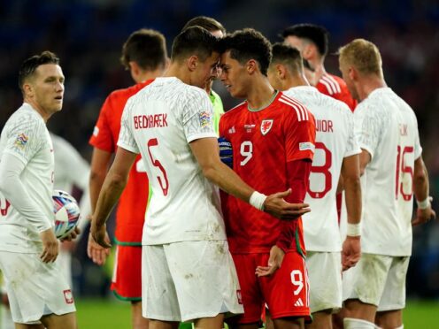Poland defender Jan Bednarek and Wales striker Brennan Johnson go head to head in a Nations League encounter at Cardiff in September 2022 (Mike Egerton/PA)
