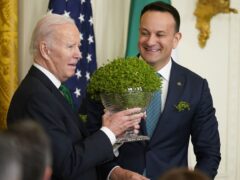 Taoiseach Leo Varadkar presents US President Joe Biden with a bowl of Shamrock last year (Niall Carson/PA)