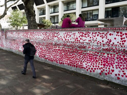 The National Covid Memorial Wall commemorates the victims of the Covid-19 pandemic in the UK (Jordan Pettitt/PA)