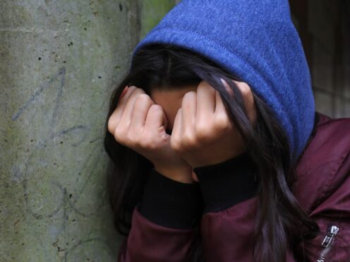 Nearly half a million children and young people in England were waiting to access or undergoing mental health treatment in November 2023 (Gareth Fuller/PA)