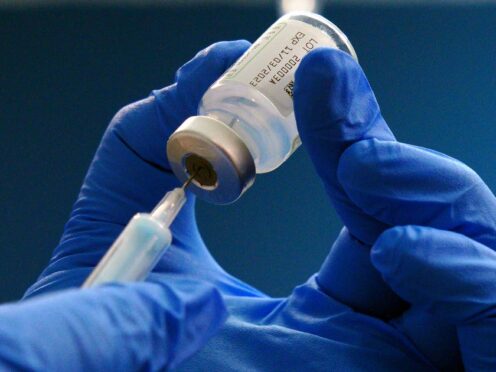 The 62-year-old had not reported any vaccine-related side-effects, researchers said (Peter Byrne/PA)
