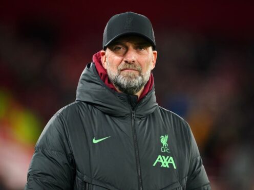 Jurgen Klopp’s Liverpool are level on points with Premier League leaders Arsenal with 10 games to go and through to the Europa League quarter-finals, having already won the League Cup (Peter Byrne/PA)