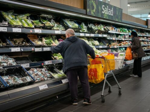 Grocery price inflation has dropped to a new two-year low but almost a quarter of British households say they are still struggling financially, according to latest figures (Aaron Chown/PA)